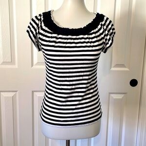 black and white striped shirt sleeve shirt with thick block designs around neck